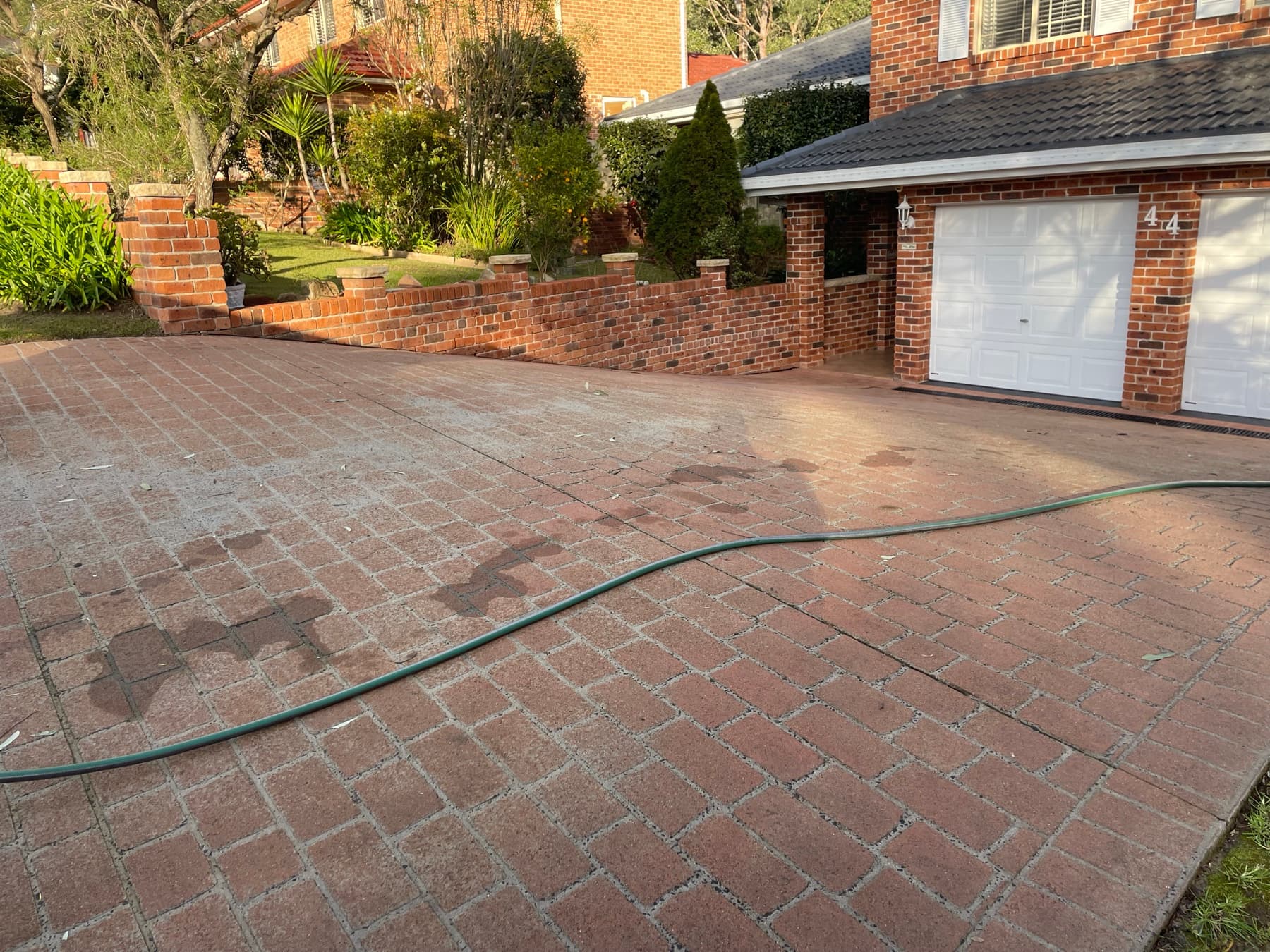 Faded terracotta, sealed to charcoal before
