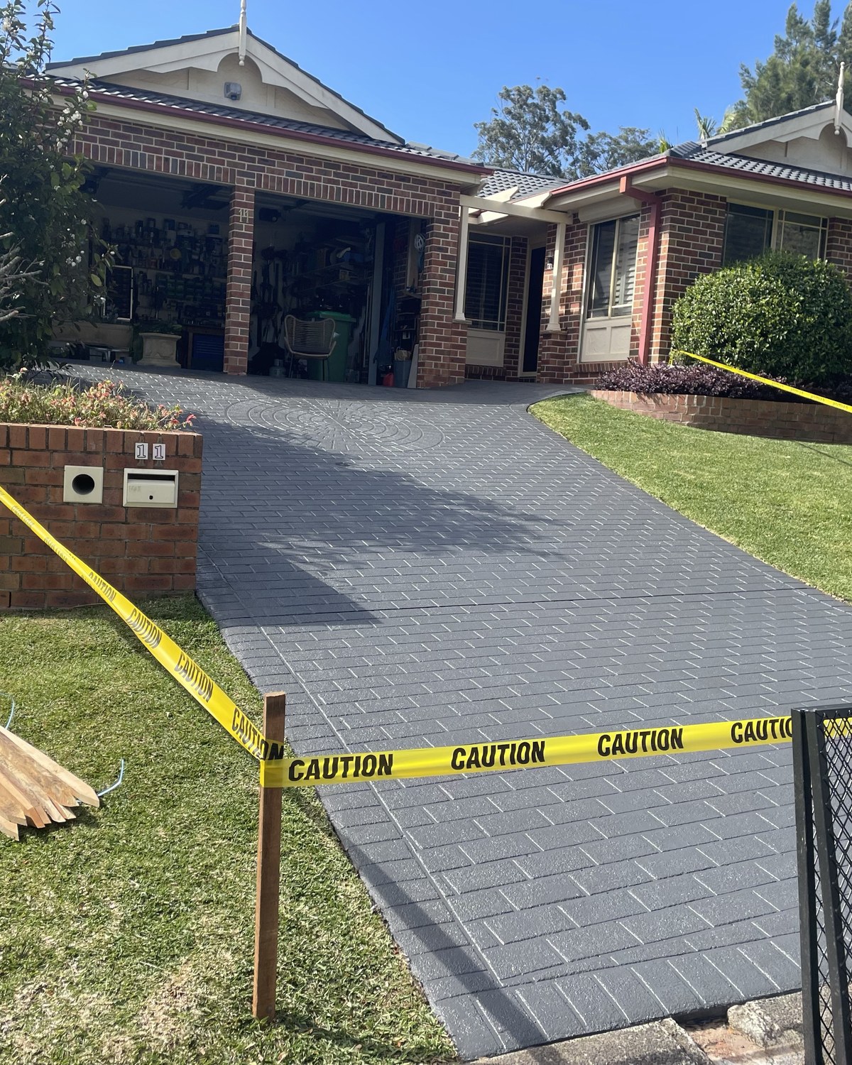 Freshly sealed paver driveway on the Central Coast